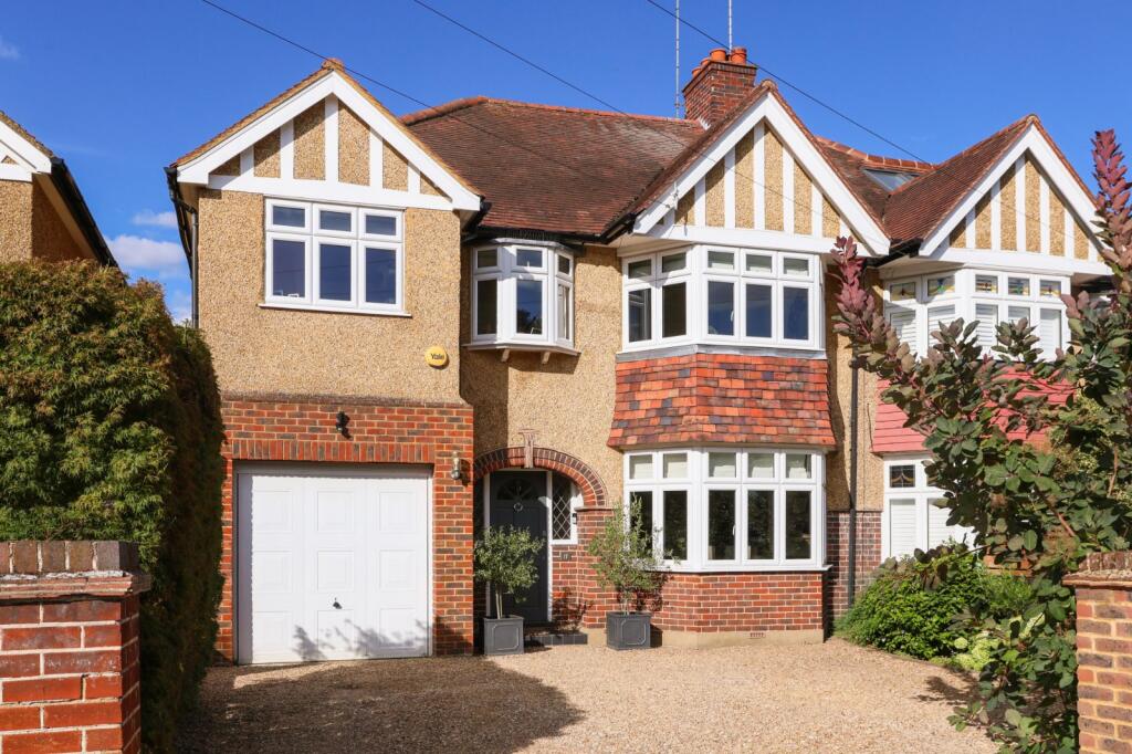 Main image of property: Sandy Way, Walton-on-Thames, Surrey, KT12