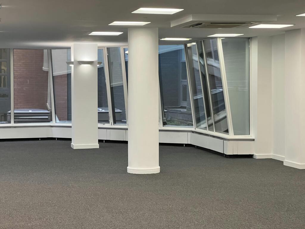 30-31 Furnival 1st Floor  OpenPlan Office With Large Windows And Pillar.jpg