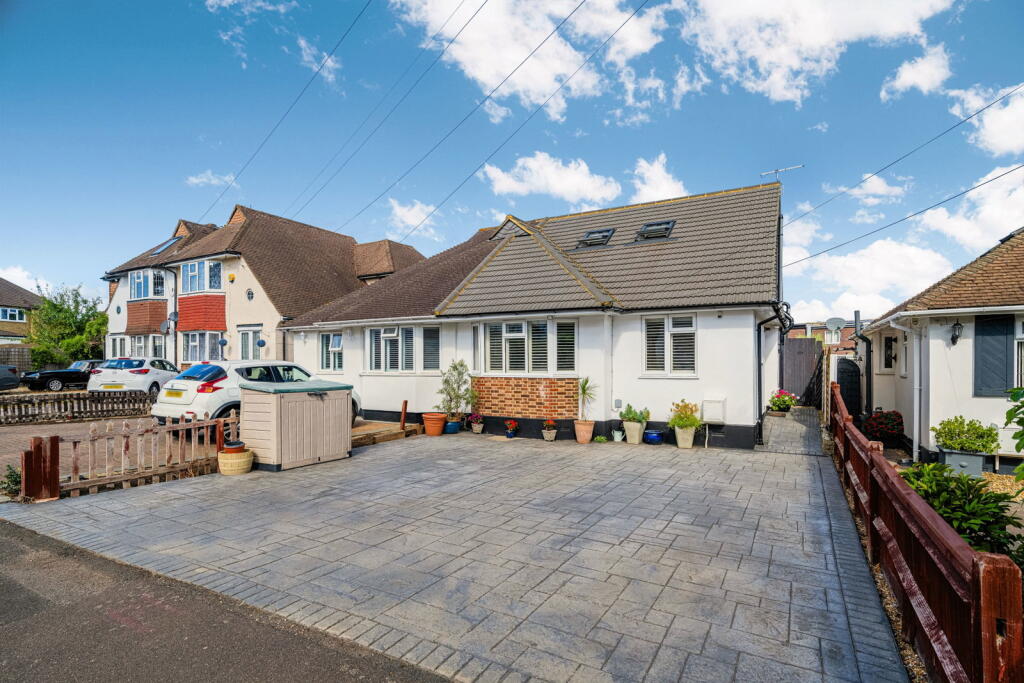 Main image of property: Grafton Road, Worcester Park, KT4 7QR