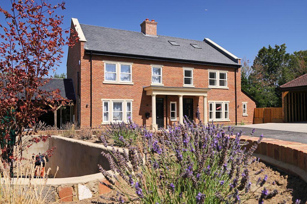 Main image of property: Paddock Grove Effingham KT24