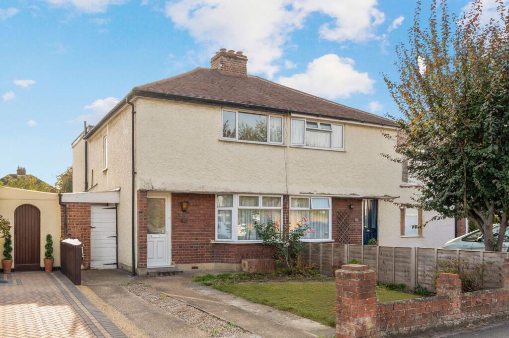 Main image of property: Molesey Road, Hersham Village, KT12