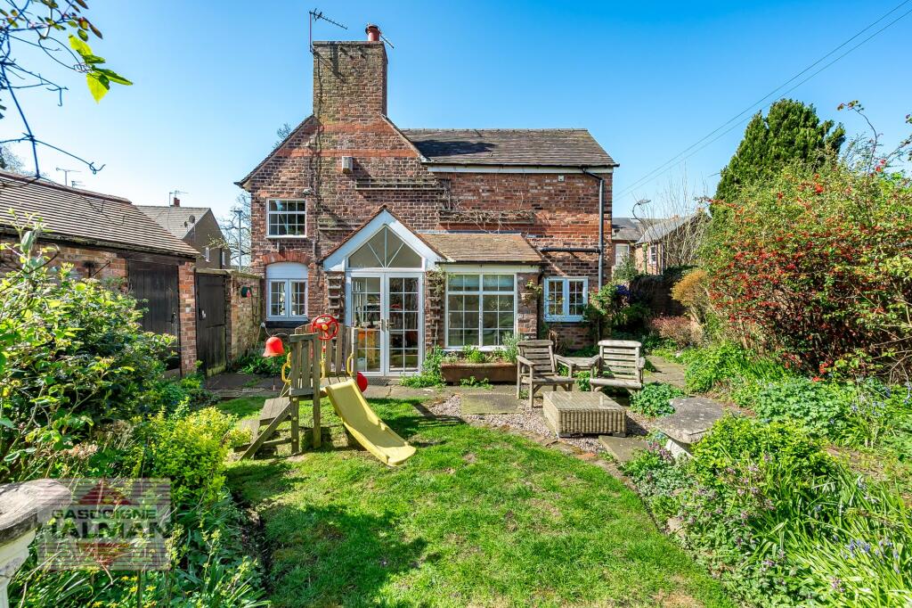 Main image of property: Clare Cottage, 14 Church Road, Handforth, SK9 3LT