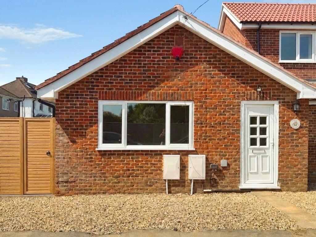 Main image of property: Clandon Avenue, Egham, Surrey, TW20