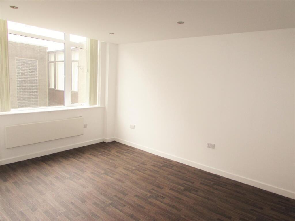 Main image of property: ONE BEDROOM APARTMENT WITH PARKING