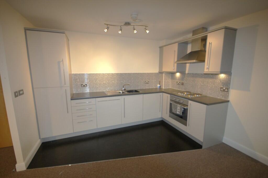 Main image of property: Wren Nest Mill, Glossop Brook Rd, Glossop, SK13 8GJ **PARKING**