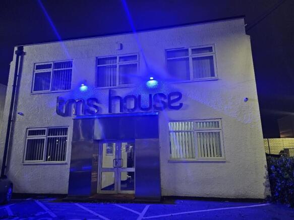 TMS House at night