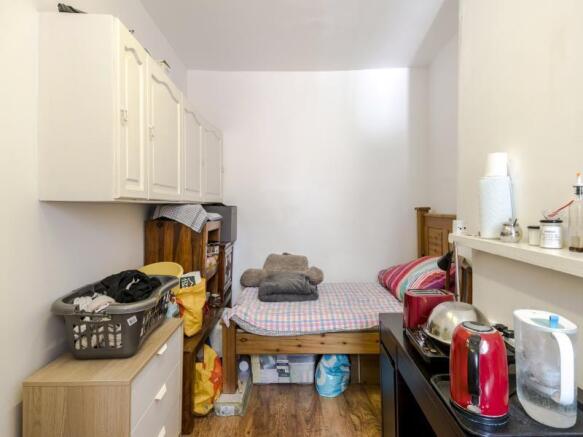 Living quarters second and third floor.