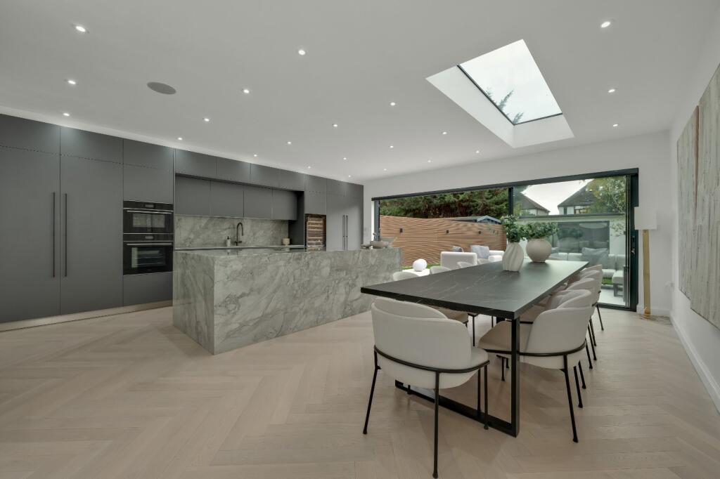 Main image of property: Couchmore Avenue, Esher, Surrey, KT10