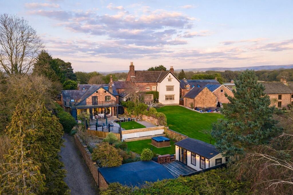 Main image of property: Old Hall Lane, Woodford, SK7