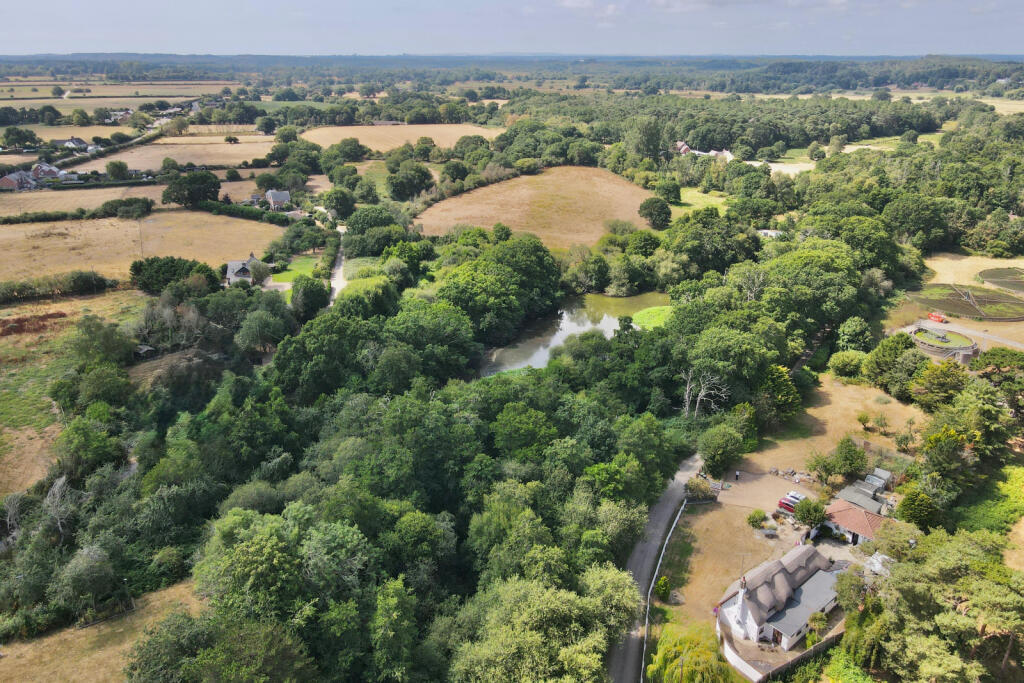 Main image of property: Three Willows, Kingston Common, BH24 3AZ