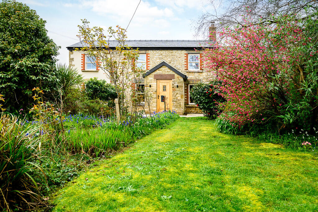 Main image of property: Edge of village, Cottage & Extensive Garaging