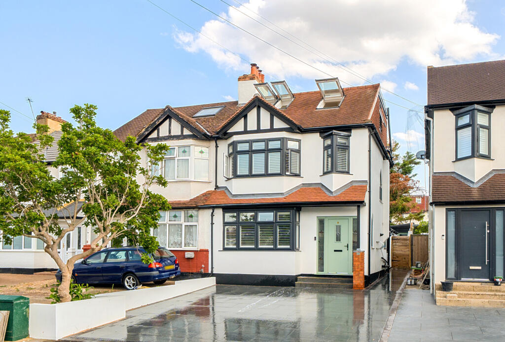Main image of property: Carlingford Road, Morden, SM4