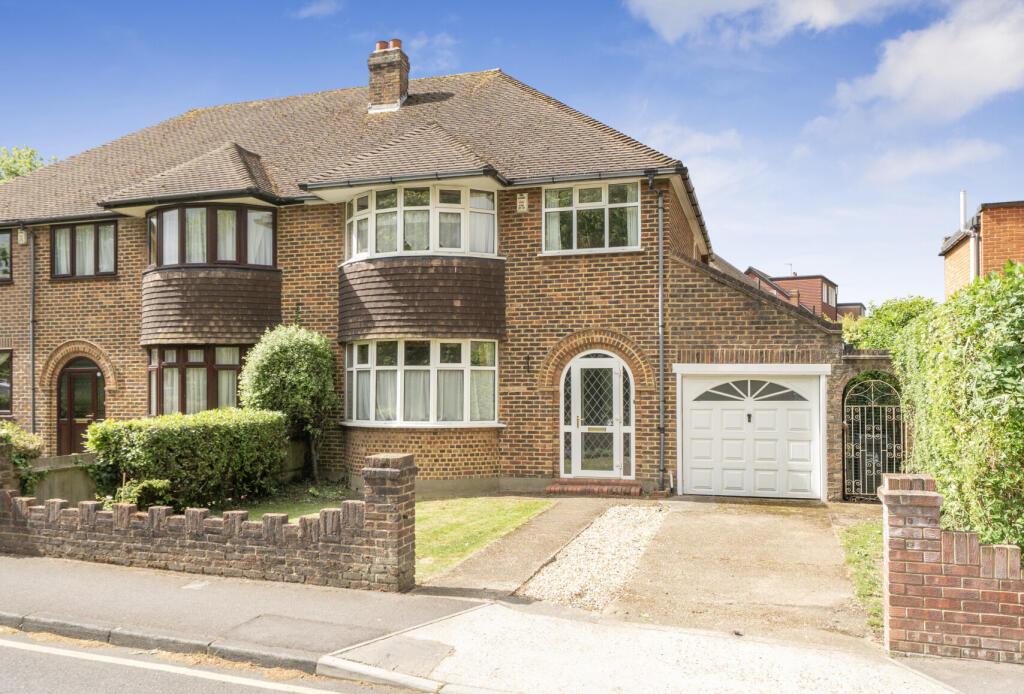 Main image of property: Downfield, Worcester Park, KT4