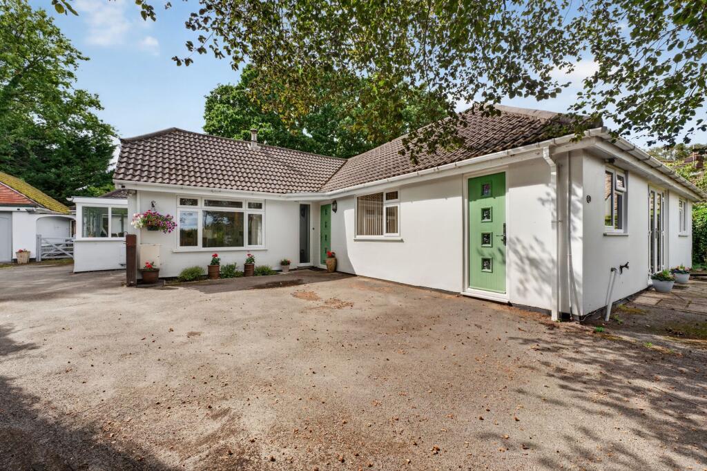Main image of property: Martins Hill Close, Burton, BH23
