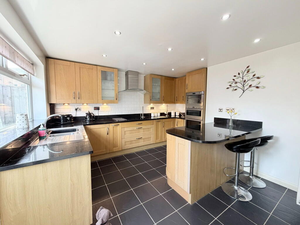 Main image of property: Grange Close, Hyde, SK14 5PW