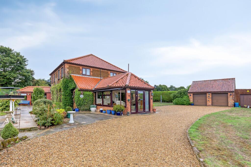 Main image of property: Unique Reverse Level Home with No Onward Chain in Castle Rising
