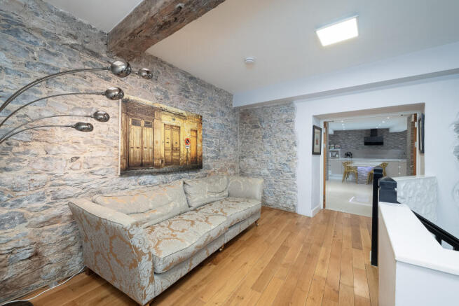 Elegant Landing - original beams & exposed stone w