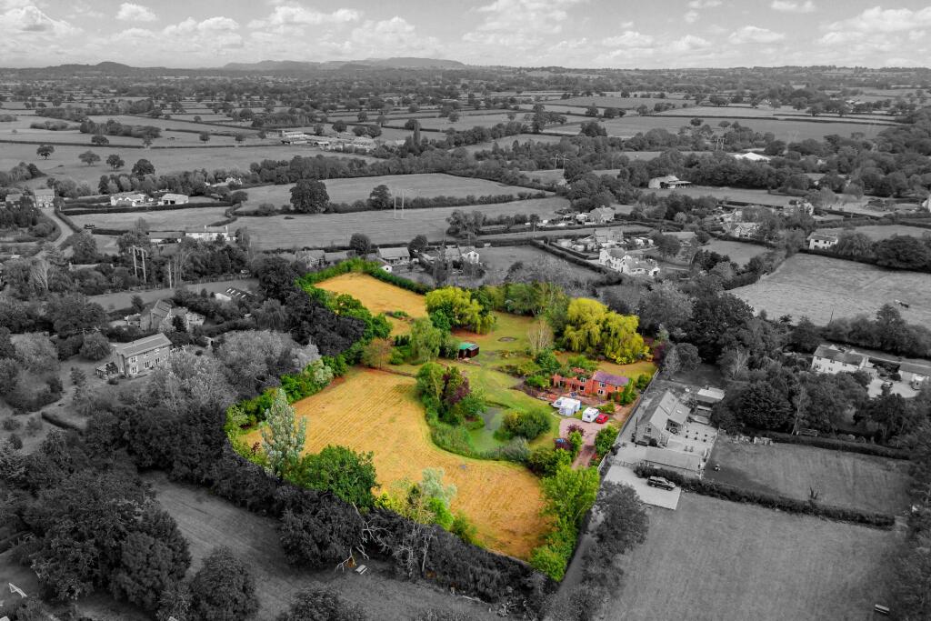 Main image of property: 3.8 acre plot of land with planning for a 3,300 sq ft property