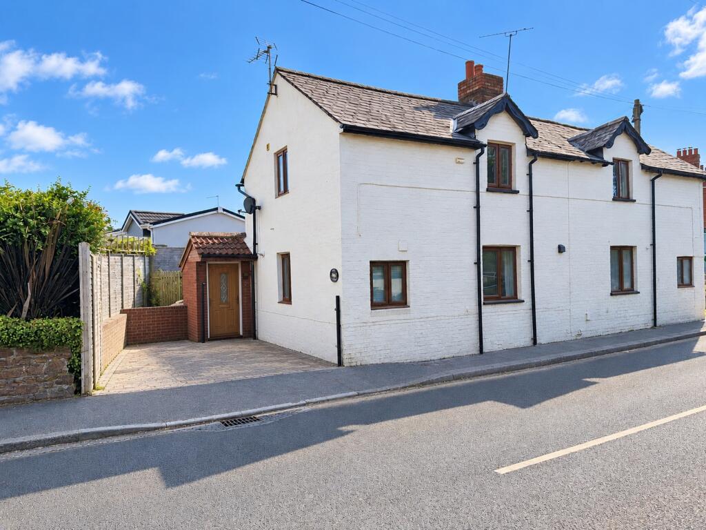 Main image of property: Swiss Cottage, Wiveliscombe Road, Norton Fitzwarren, Taunton, Somerset