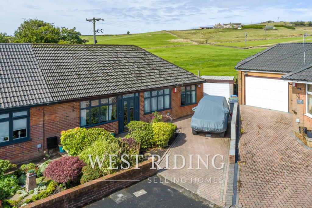 Main image of property: Lyndon Close, Scouthead, Saddleworth, OL4 4AN