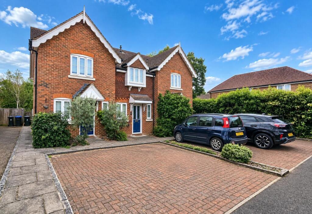 Main image of property: Woodside, New Haw, Addlestone