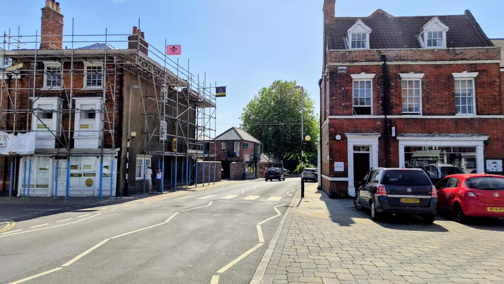 Generalised view from Wednesday Market, along Lord Roberts Road, towards Minster Towers