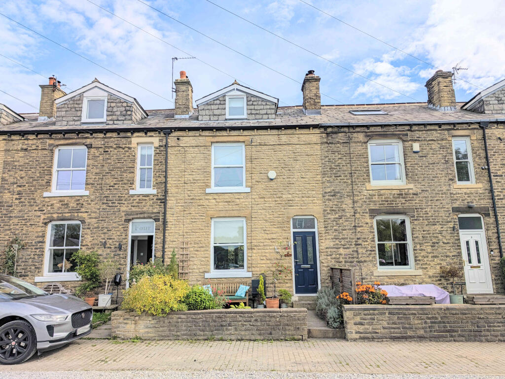 Main image of property: 3 Wells Terrace, Village Street, Norwood Green, HX3 8QA