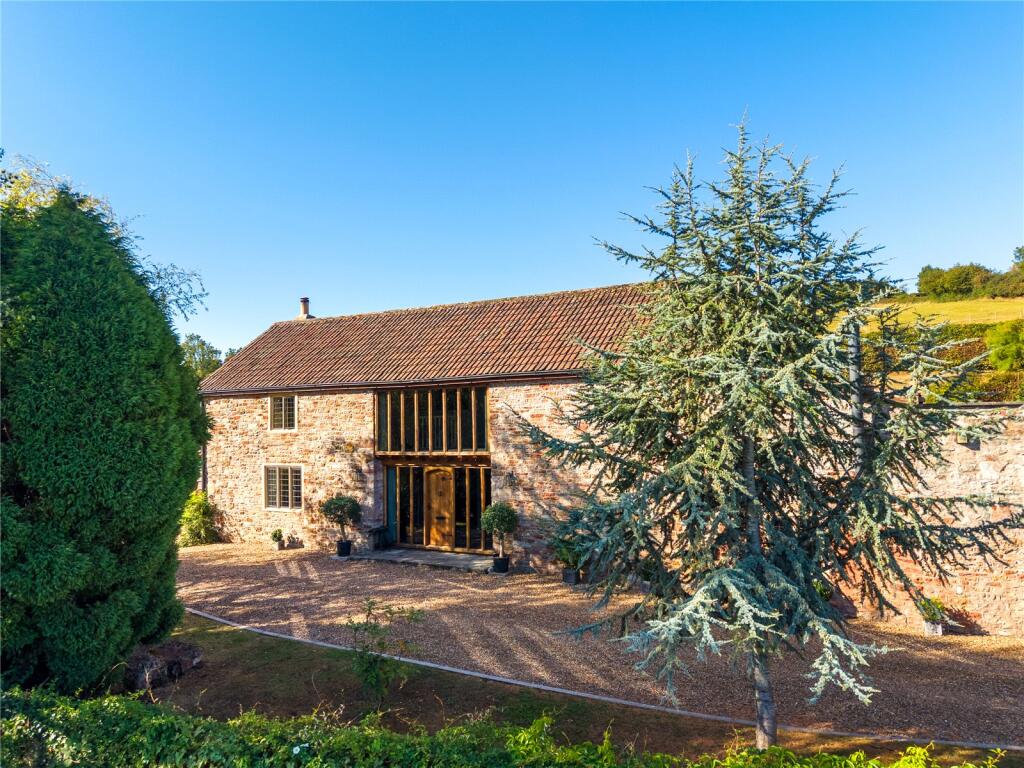 Main image of property: A charming barn conversion with outstanding views across the Chew Valley, West Harptree