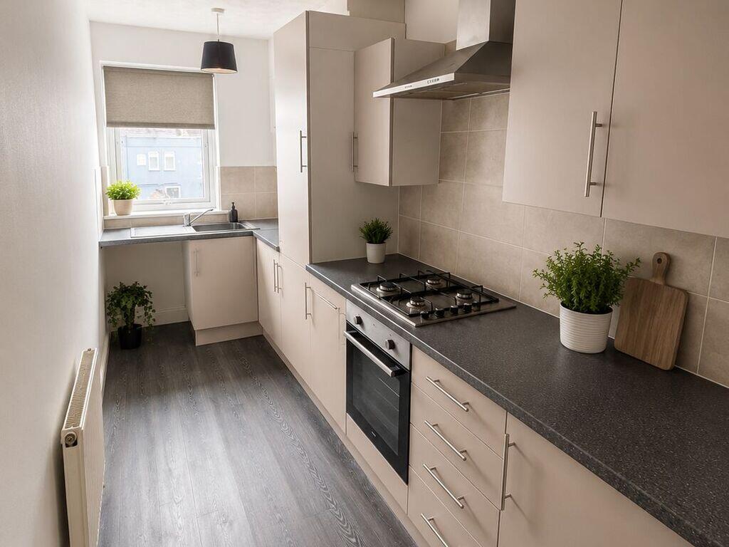 Main image of property: Top Floor Flat 10 Holyrood Place