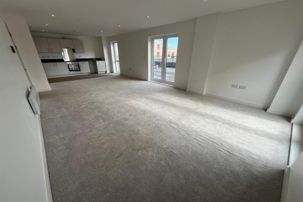 Main image of property: 3 bedroom Apartment Three-Bedroom Apartment in Manchester 