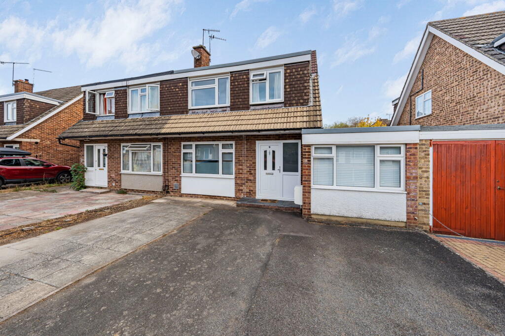 Main image of property: Moore Grove Crescent, Egham, TW20 9RH