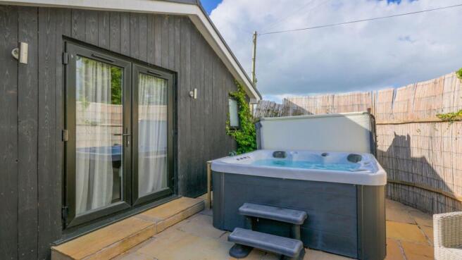 Rear terrace with hot tub