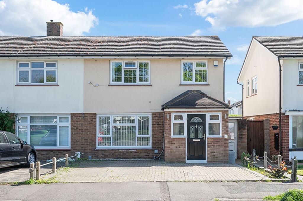 Main image of property: Harvester Road, Epsom, KT19