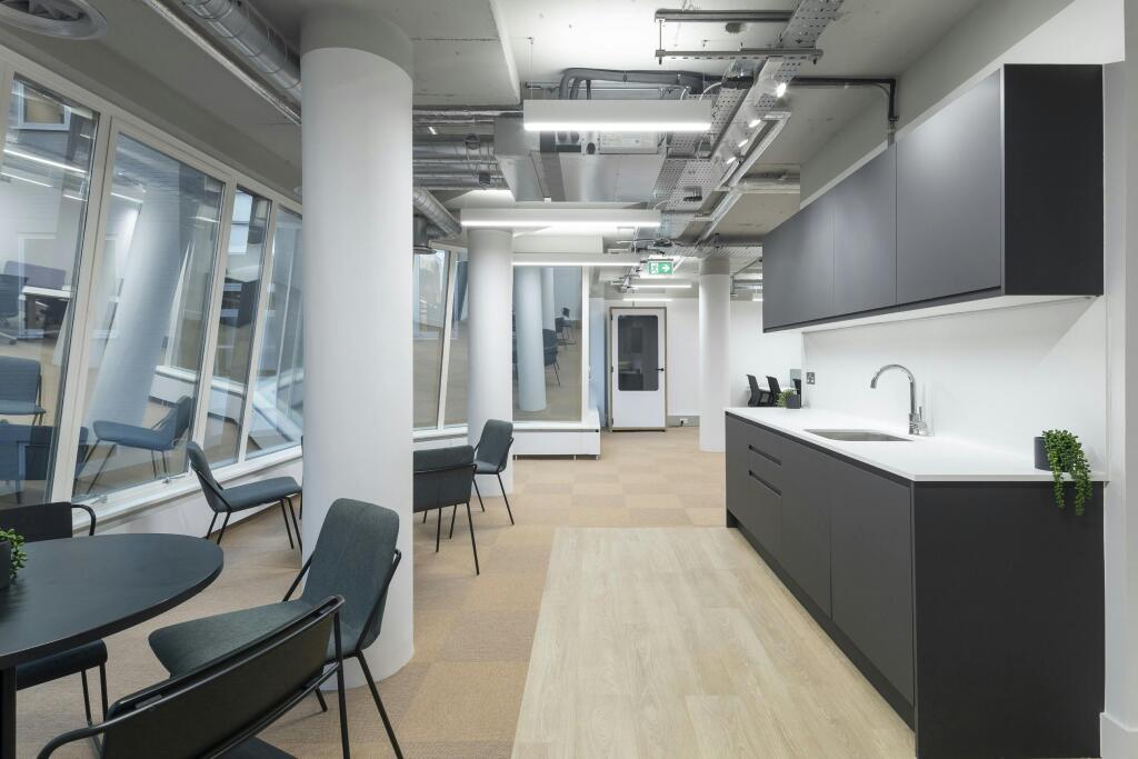3031 Furnival Street   Modern Office Kitchenette With Seating And Large Windows.jpg