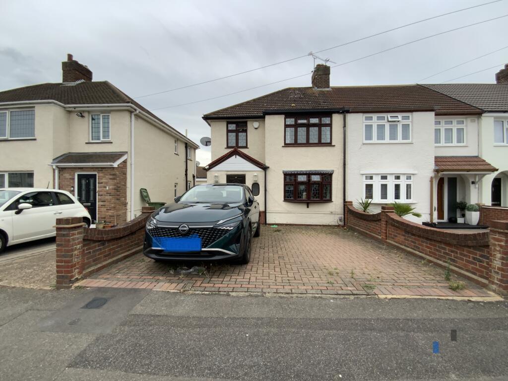Main image of property: Carnforth Gardens, Hornchurch, Havering