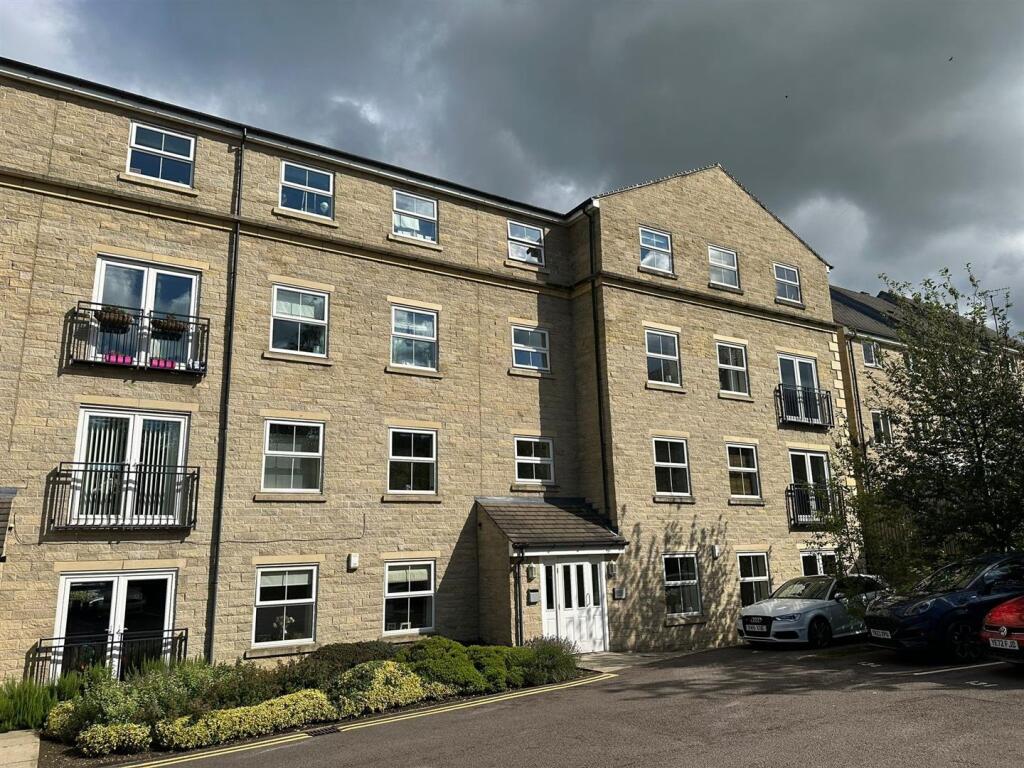 Main image of property: Axminster Drive, Brighouse