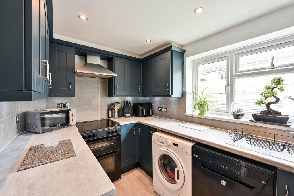Main image of property: Edenside Road, Bookham, KT23