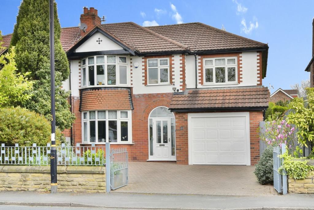 Main image of property: Wood Lane, Timperley, WA15