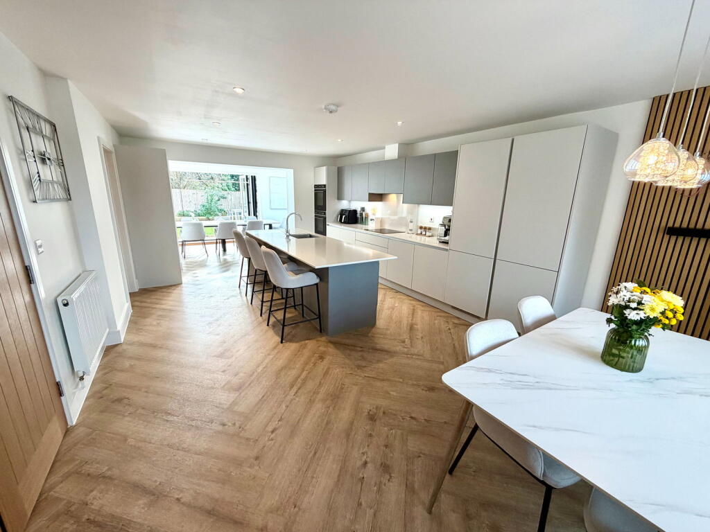 Main image of property: A stunning and generously extended detached family home with 2,852sq ft on offer!!